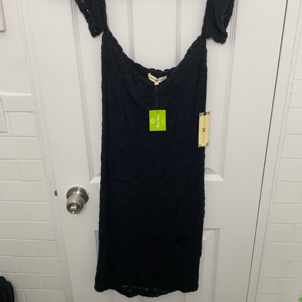 Nightcap dress. Brand new. Never worn. From planet blue